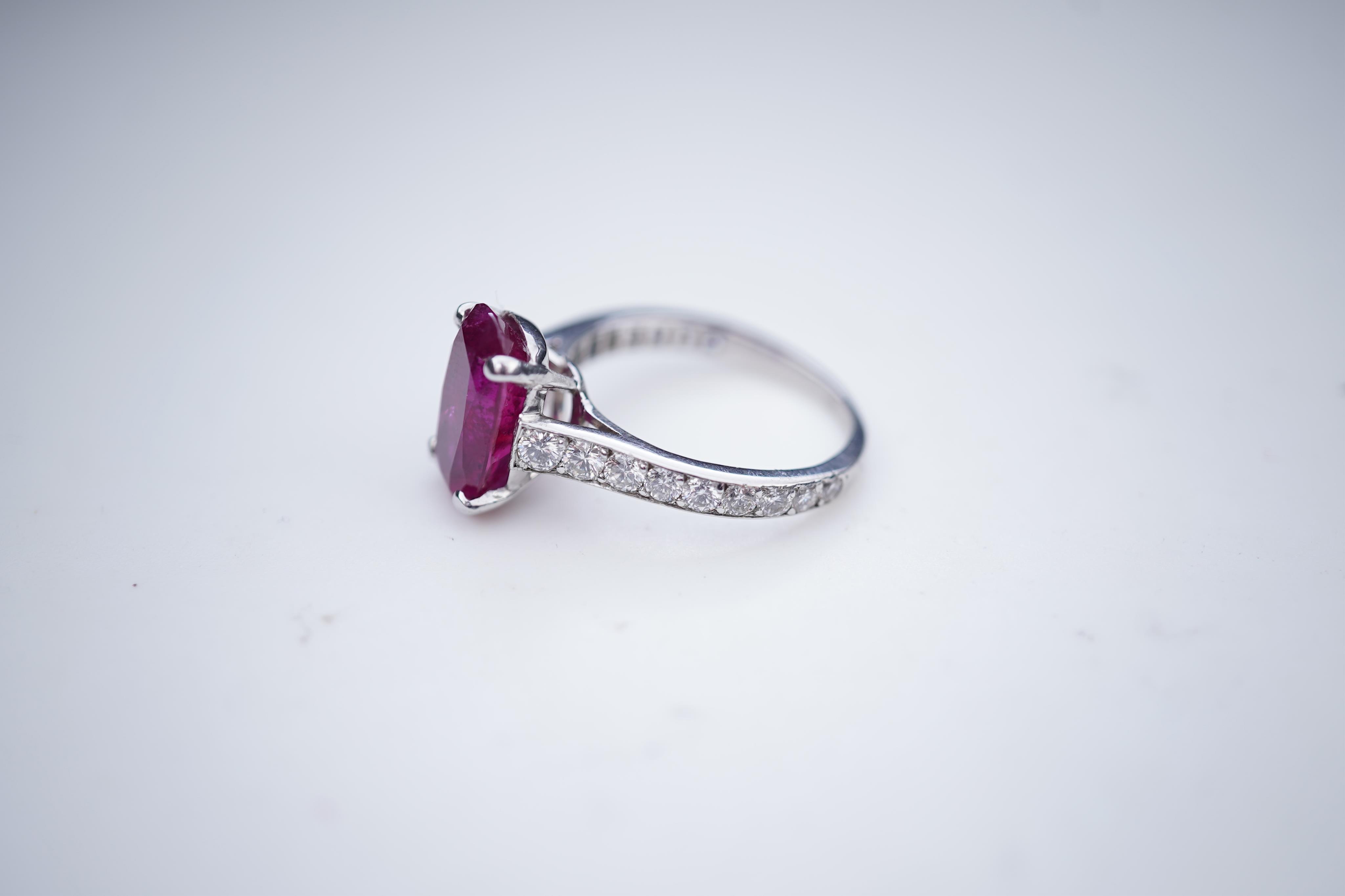 An attractive unheated ruby and diamond ring